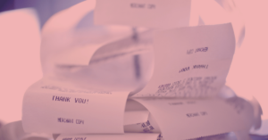 Tax on YouTube income and tax write-offs: Keep your receipts! Duotone image of a series of receipts on a receipt stabber